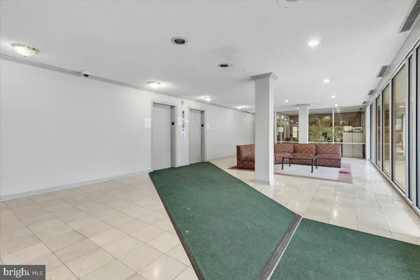 a living room with a rug