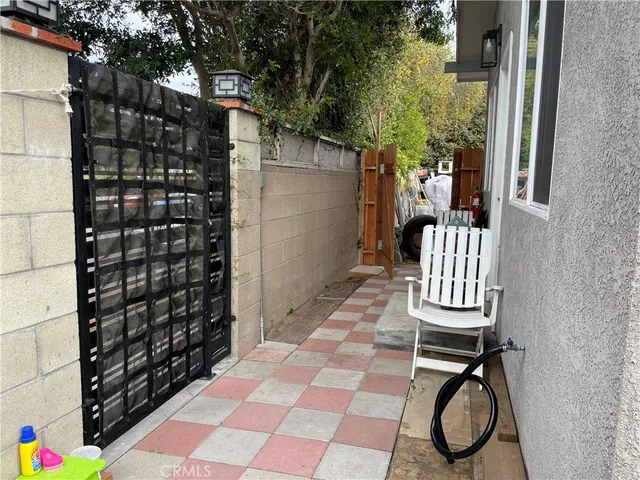 a view of two chairs in the balcony