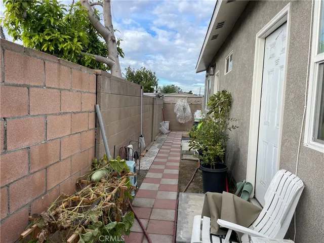 a house with flowers in front of it