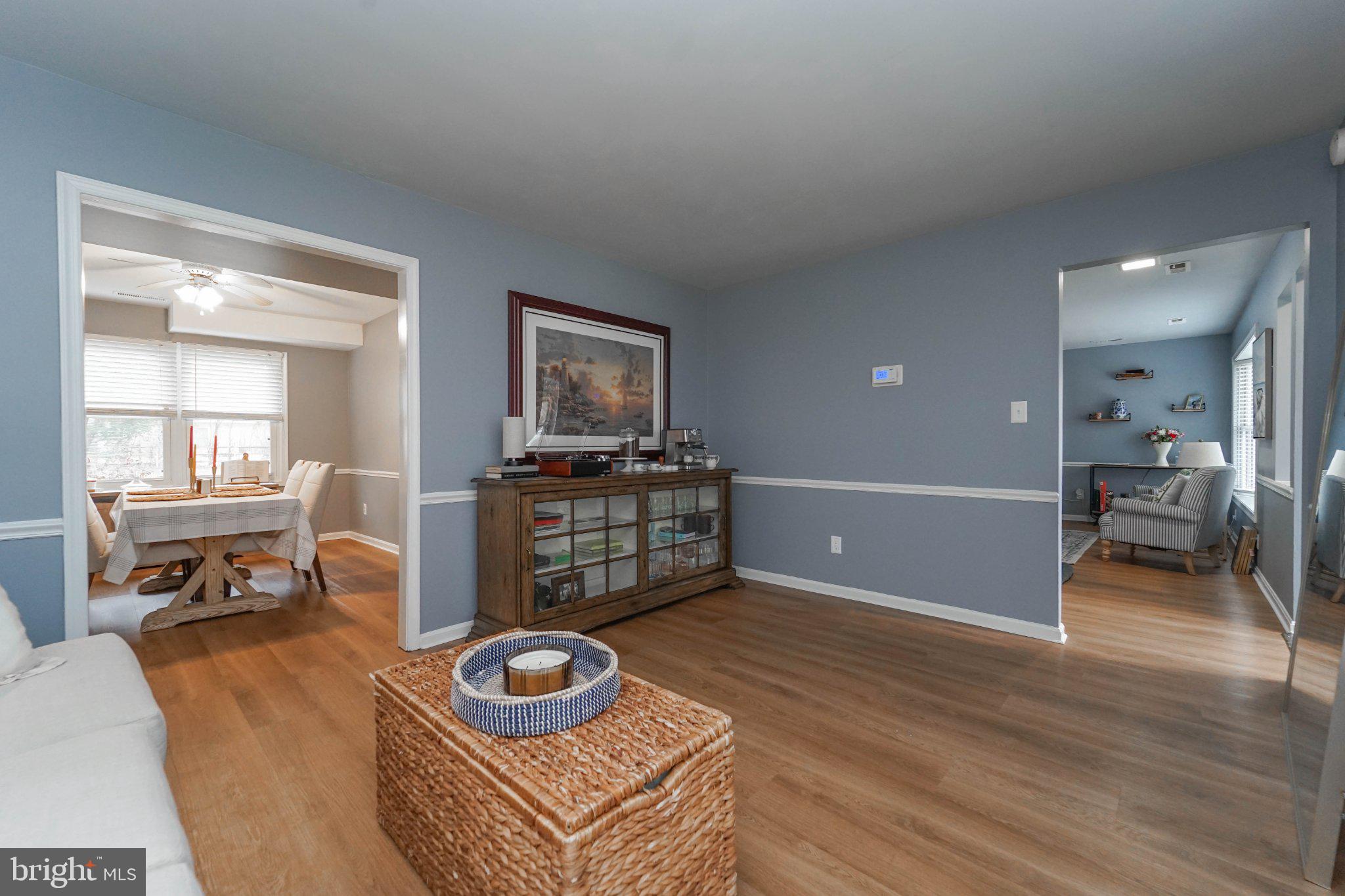 211 Queen Anne Road Stevensville, MD 21666 - Photo 20 of 33 Inviting open space with warm tones.