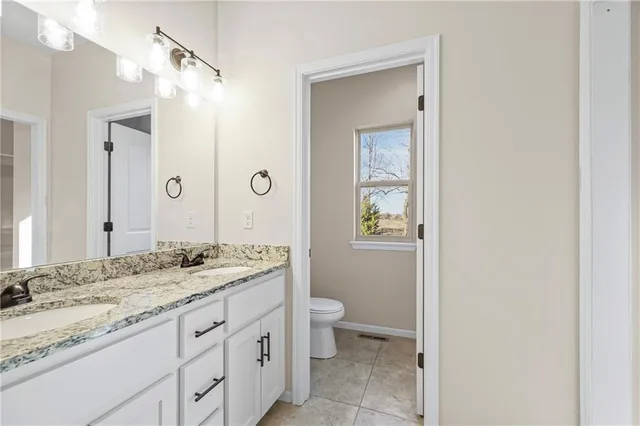 $345,000 | 1402 Southwest 8th Terrace, Oak Grove, MO 64075