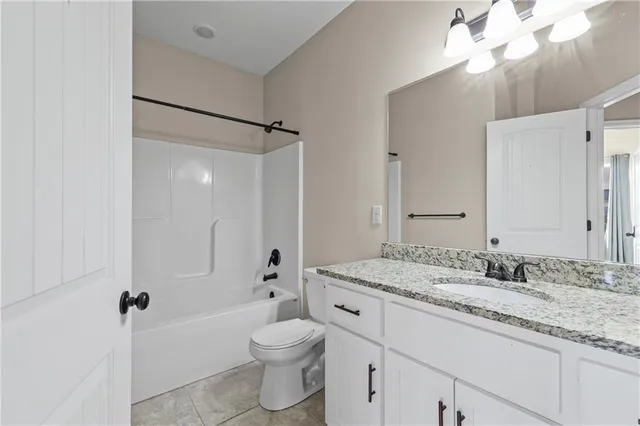 $345,000 | 1402 Southwest 8th Terrace, Oak Grove, MO 64075