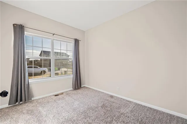 $345,000 | 1402 Southwest 8th Terrace, Oak Grove, MO 64075