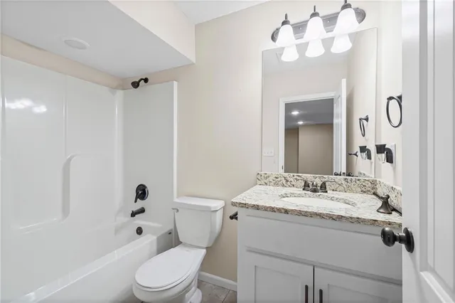 $345,000 | 1402 Southwest 8th Terrace, Oak Grove, MO 64075