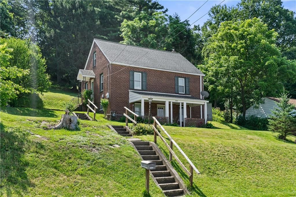 2509 Kane Road Aliquippa, PA 15001 - Photo 2 of 27 a view of a house with backyard