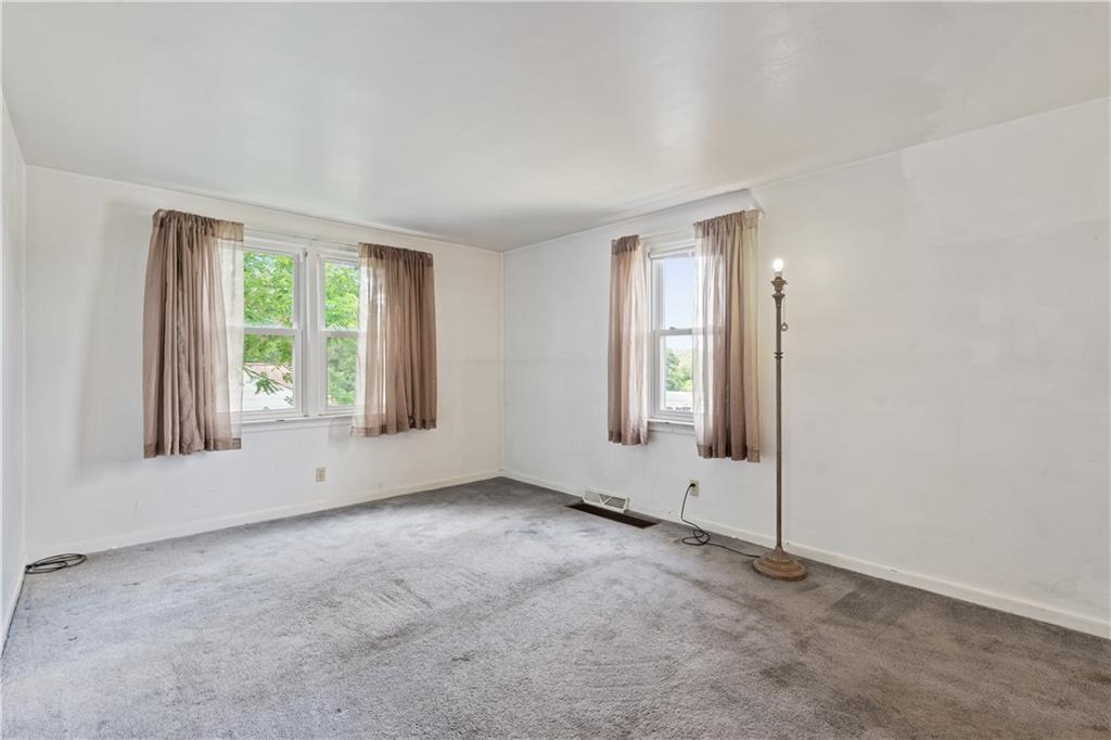 2509 Kane Road Aliquippa, PA 15001 - Photo 8 of 27 an empty room with windows