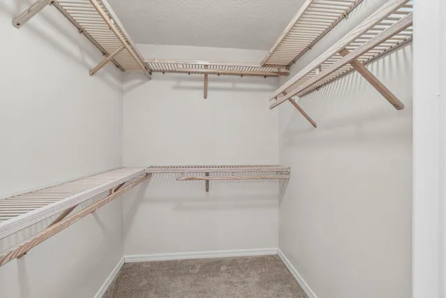 a view of a room with racks on the wall
