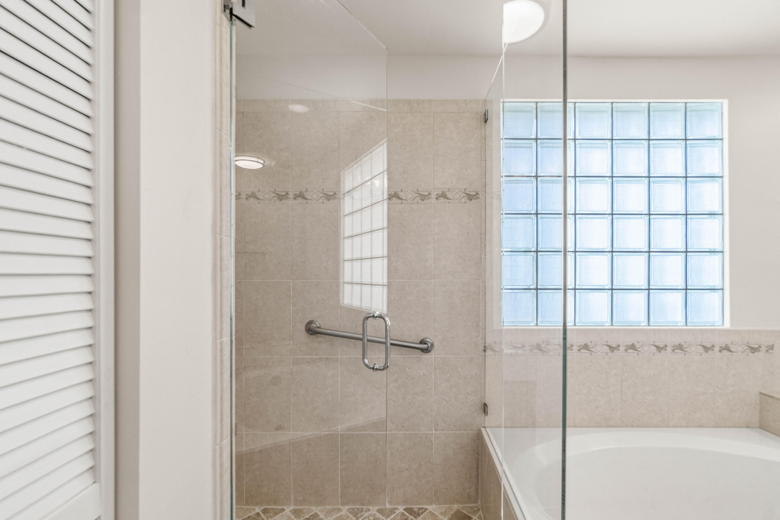 207 Pennock Trace Drive Jupiter, FL 33458 - Photo 22 of 48 a bathroom with a shower