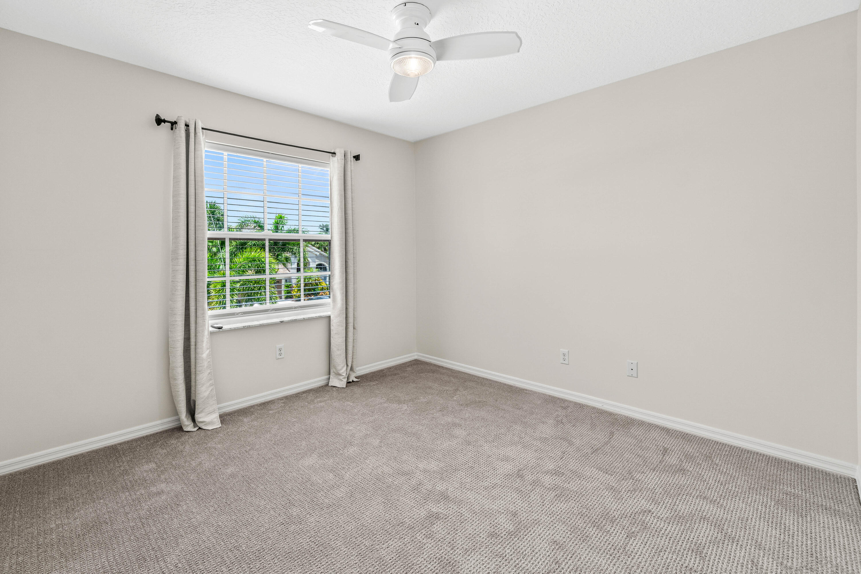 207 Pennock Trace Drive Jupiter, FL 33458 - Photo 23 of 48 an empty room with a window