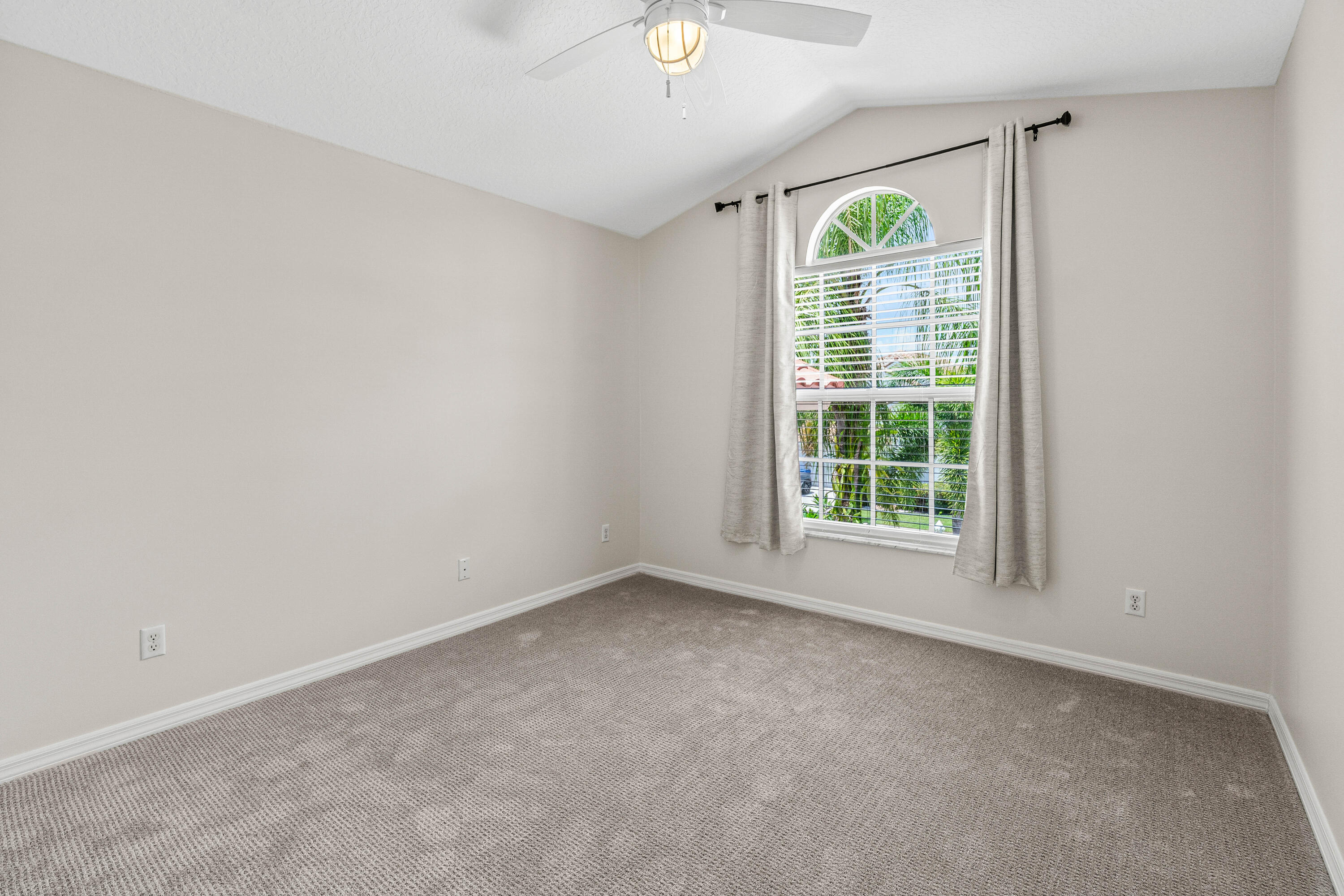 207 Pennock Trace Drive Jupiter, FL 33458 - Photo 24 of 48 an empty room with a window