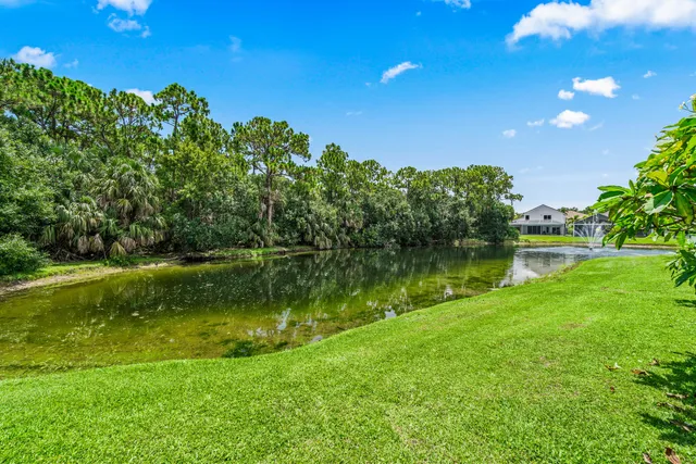 a view of a lake with a yard