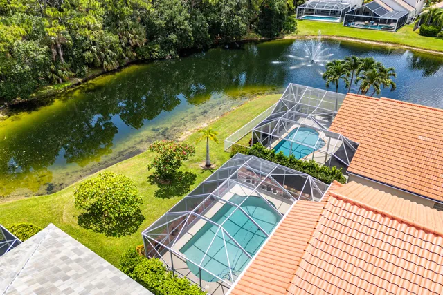 a view of a swimming pool with a patio