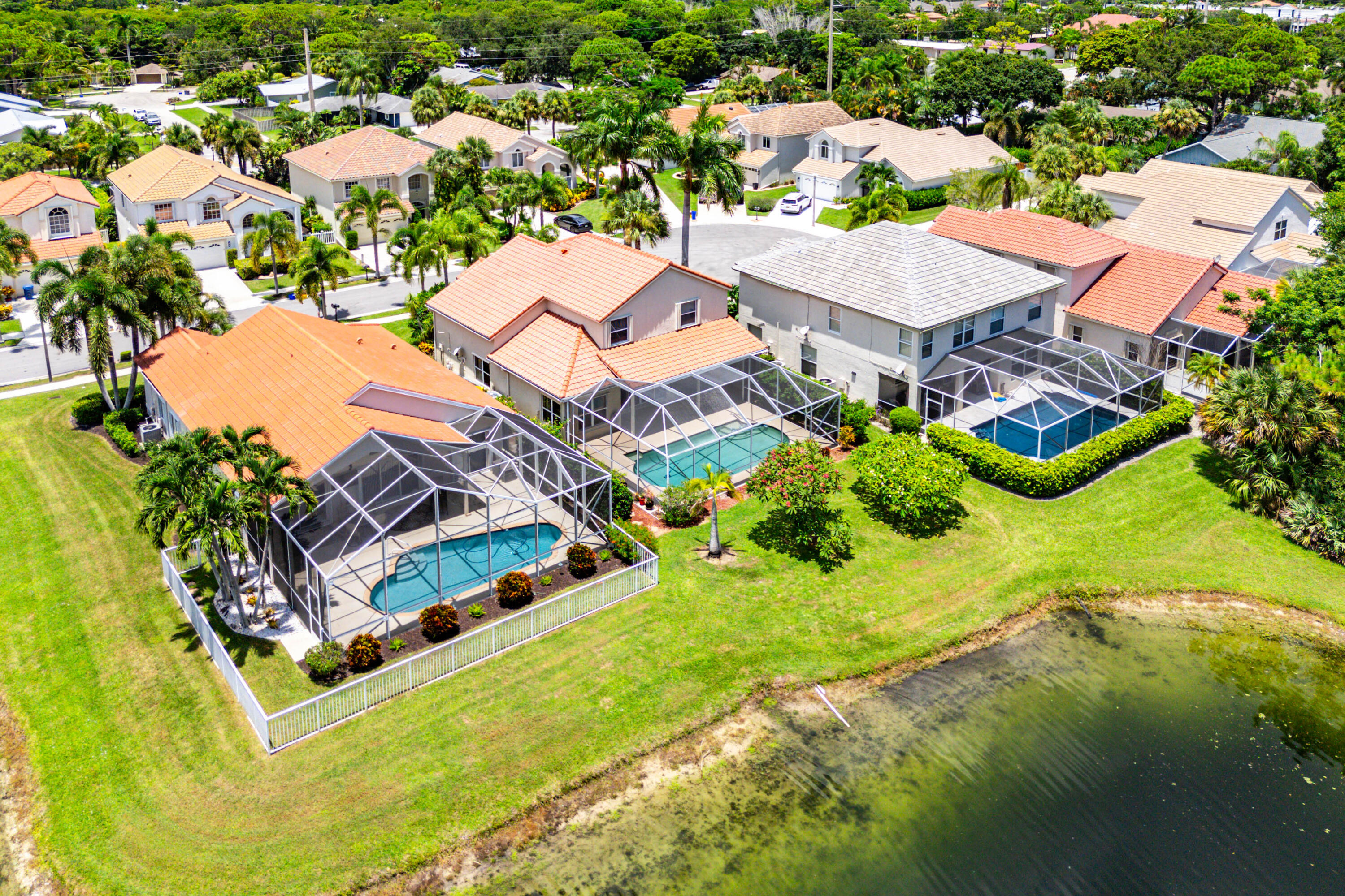 207 Pennock Trace Drive Jupiter, FL 33458 - Photo 45 of 48 an aerial view of a house with a garden and swimming pool