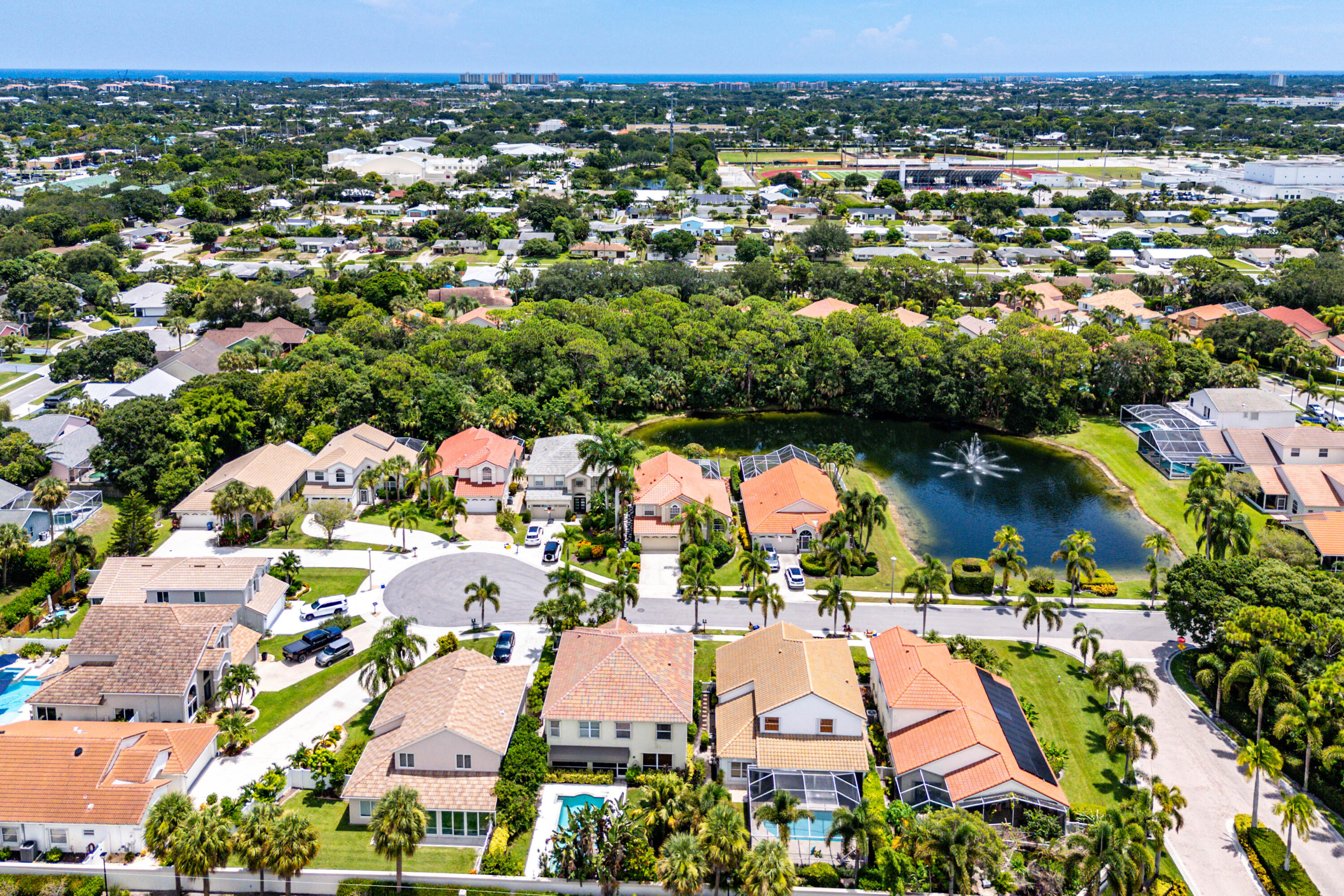 207 Pennock Trace Drive Jupiter, FL 33458 - Photo 47 of 48 an aerial view of residential houses with outdoor space