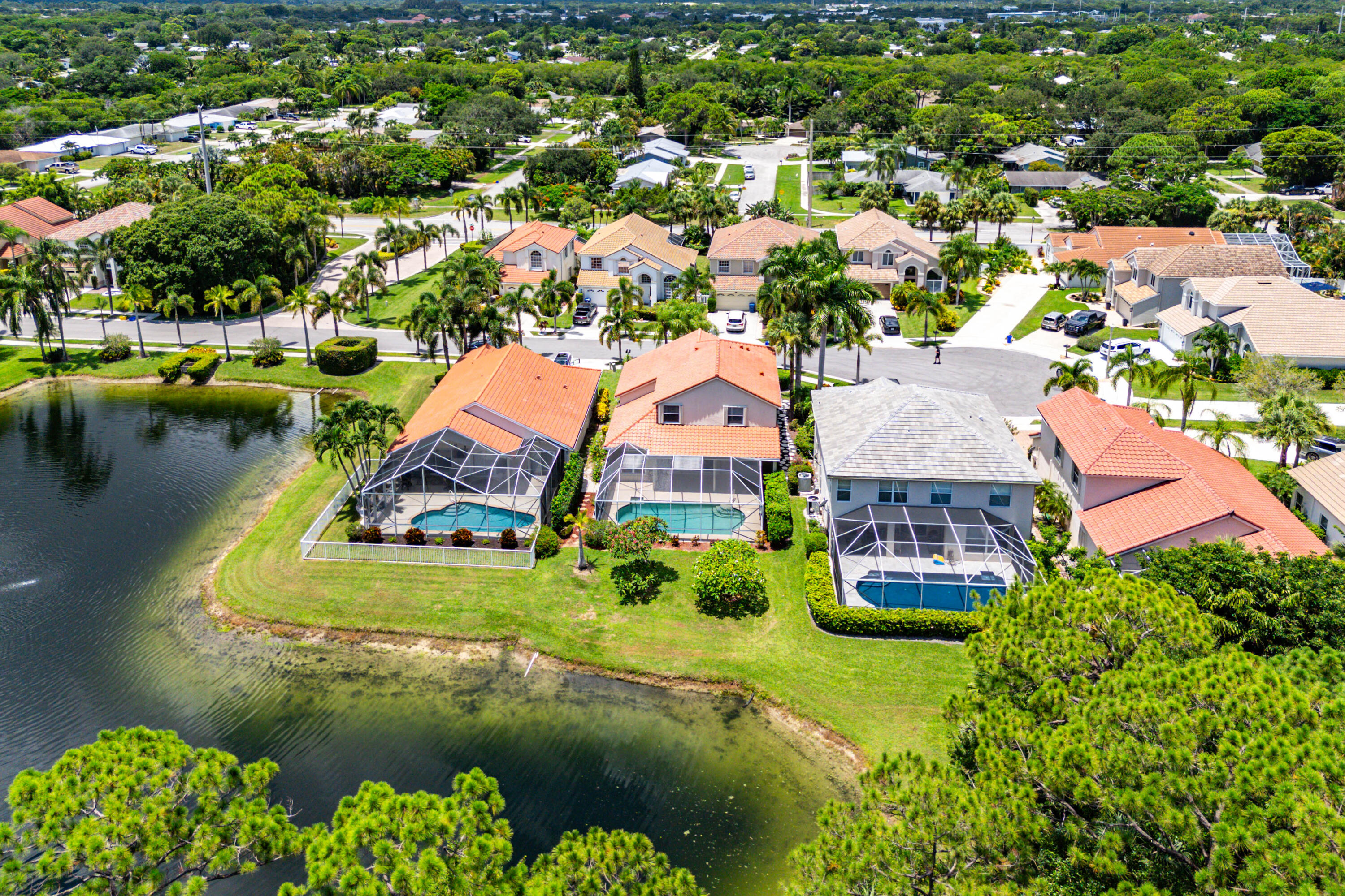 207 Pennock Trace Drive Jupiter, FL 33458 - Photo 48 of 48 an aerial view of a house with a garden and lake view