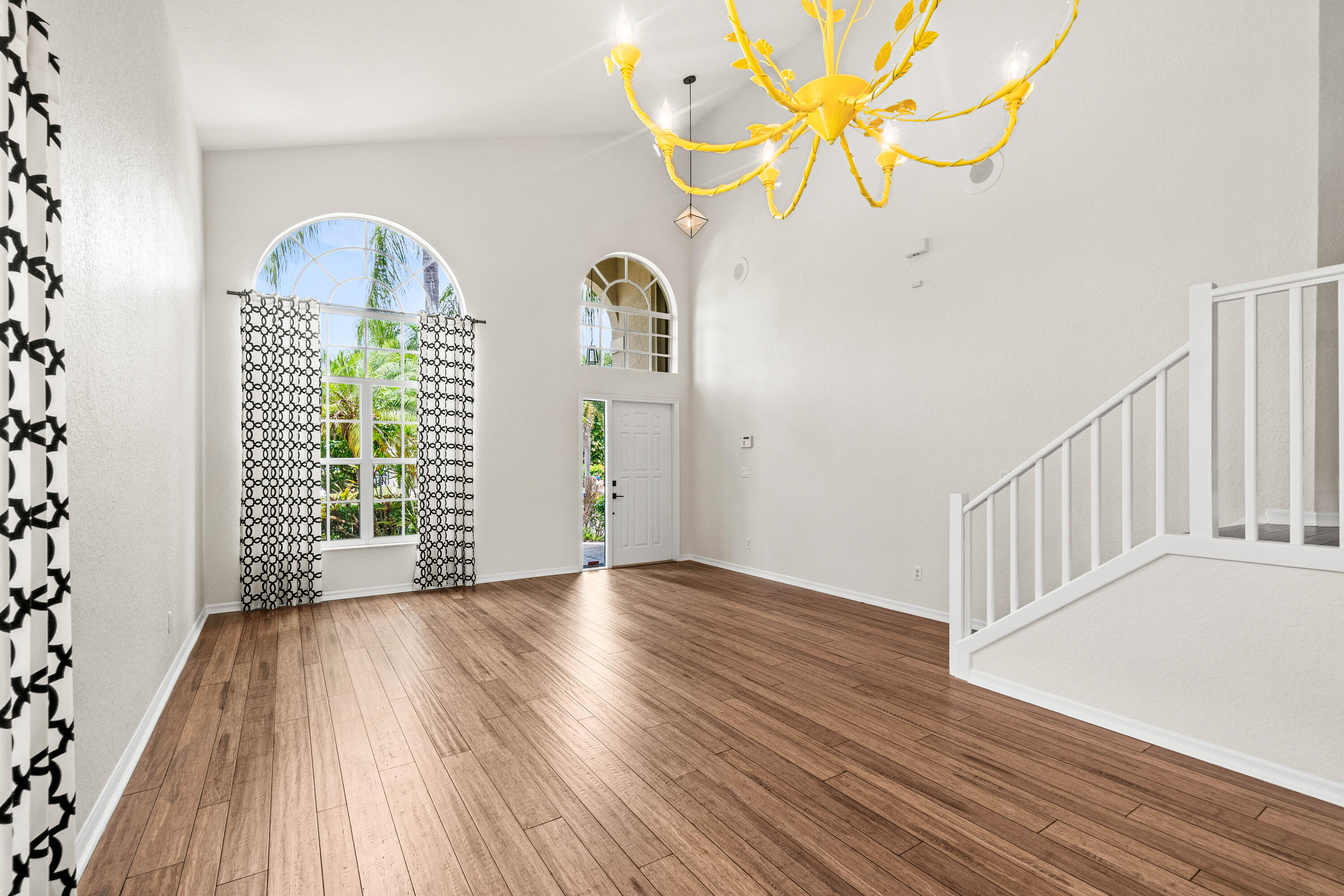 207 Pennock Trace Drive Jupiter, FL 33458 - Photo 10 of 48 a view of an entryway with wooden floor