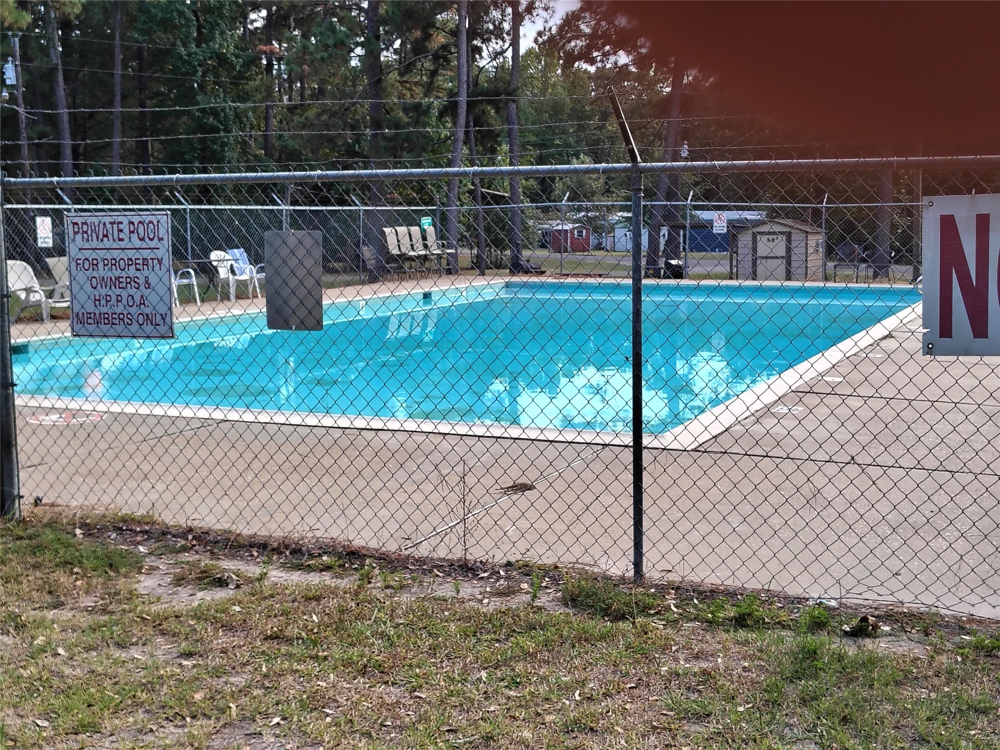 404 Lakeside Loop Trinity, TX 75862 - Photo 13 of 17 a view of a backyard with a fence