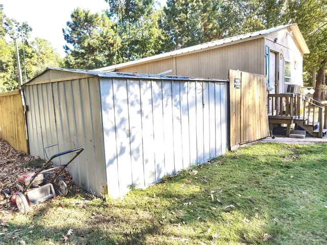 a view of a back yard of the house