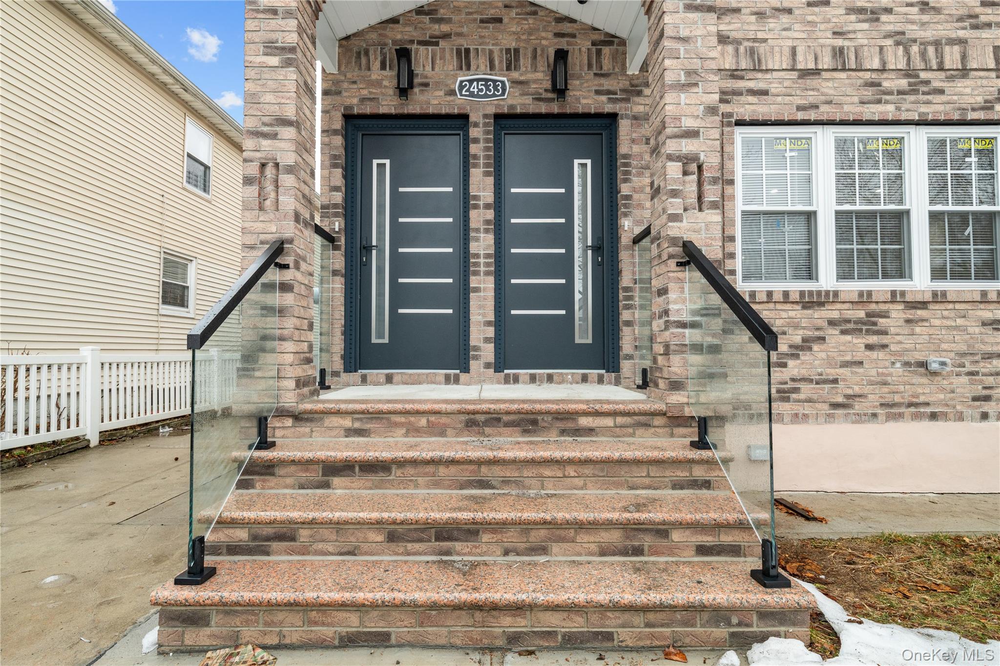 245-33 147th Road, Unit 2 Queens, NY 11422 - Photo 14 of 17 a view of entryway with a front door