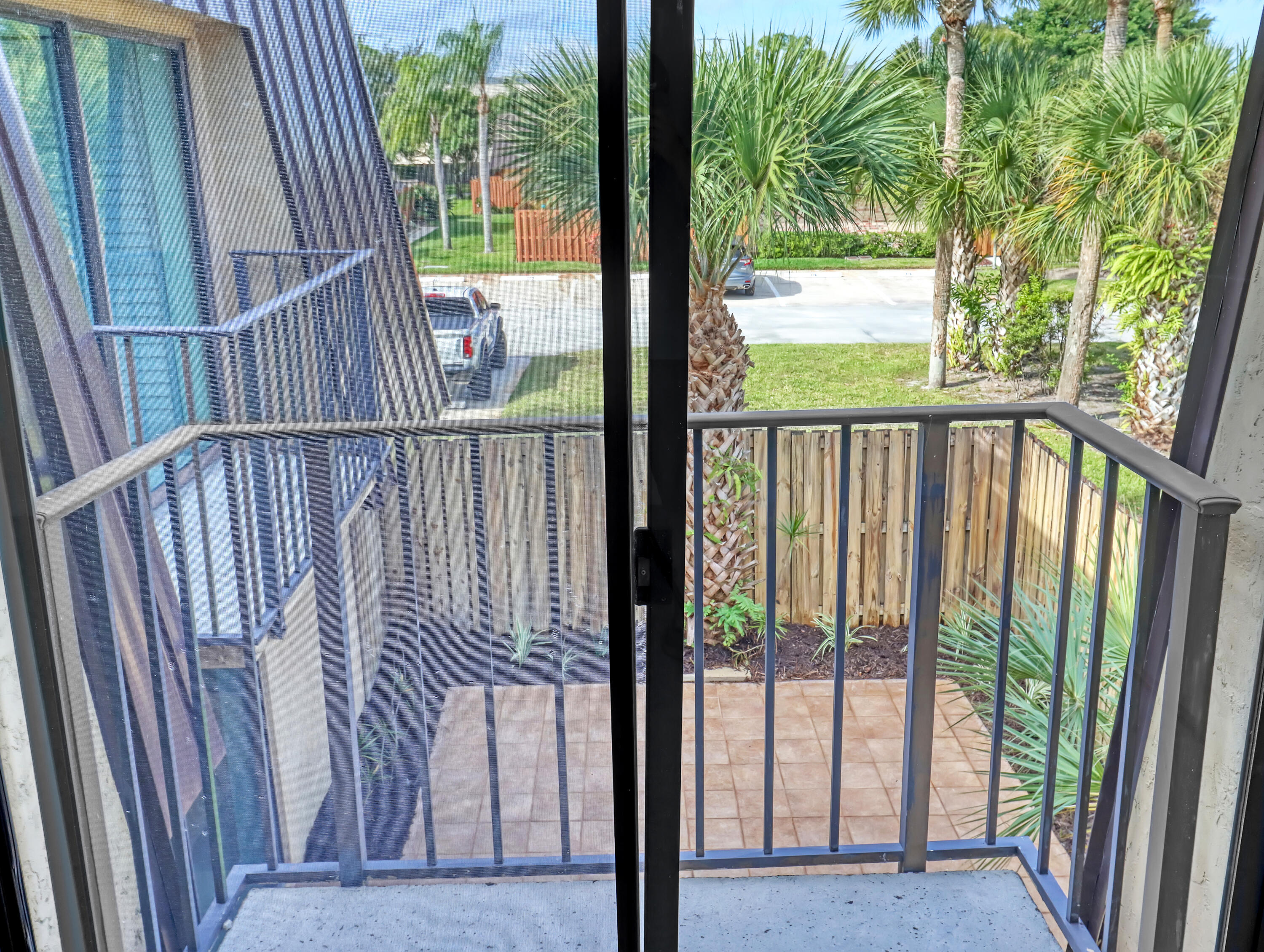 5738 Southeast Windsong Lane, Unit 315 Stuart, FL 34997 - Photo 25 of 32 a view of staircase with large window