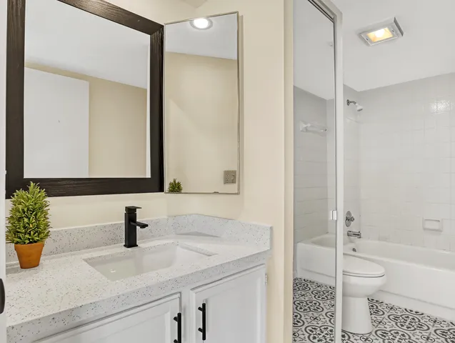 a view of a swimming pool with a yard