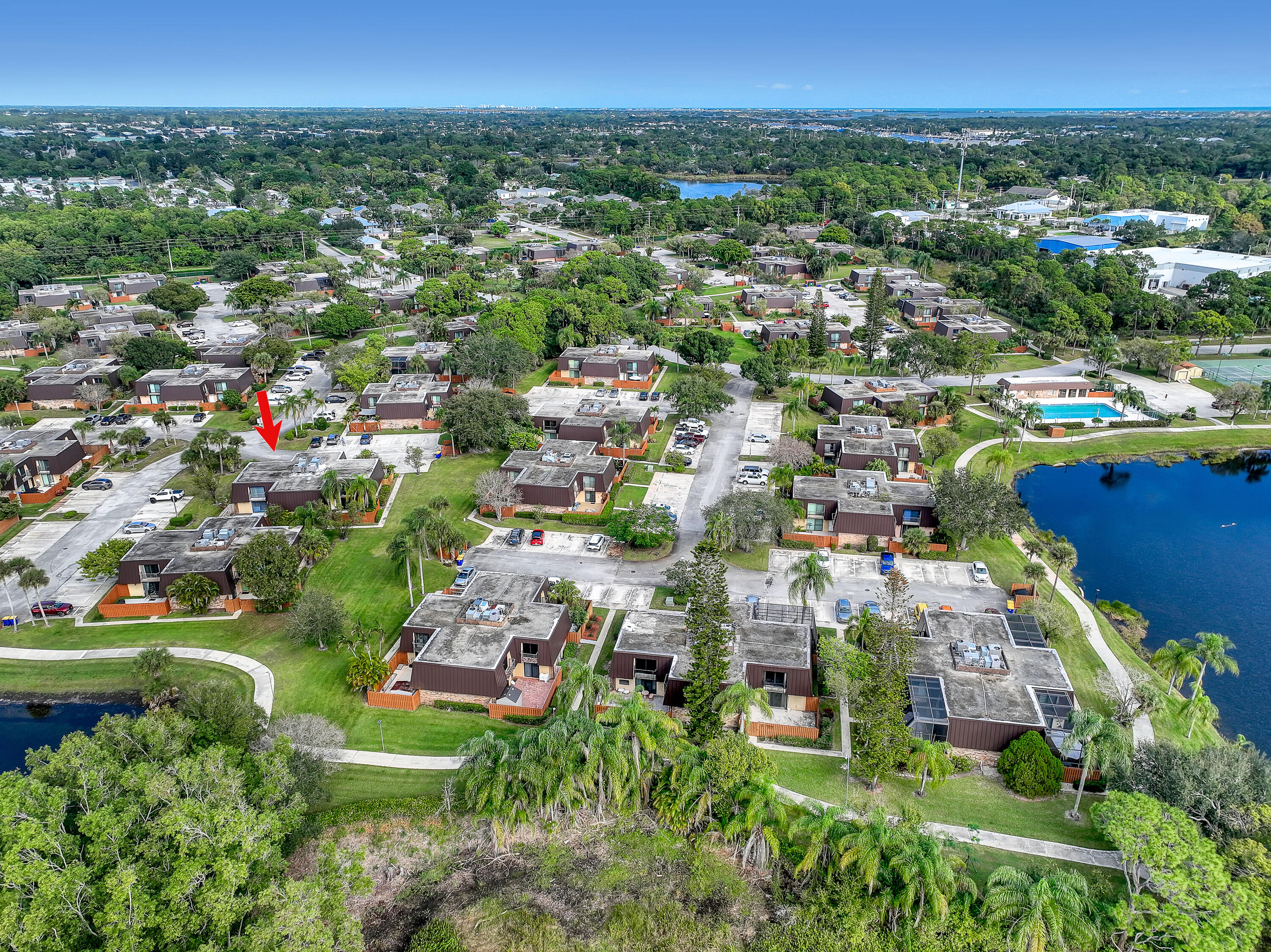 5738 Southeast Windsong Lane, Unit 315 Stuart, FL 34997 - Photo 29 of 32 a view of a city