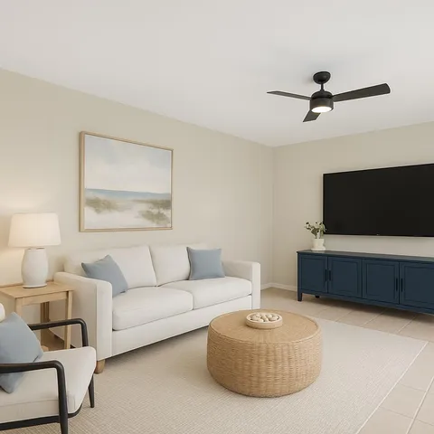 a living room with furniture and a flat screen tv