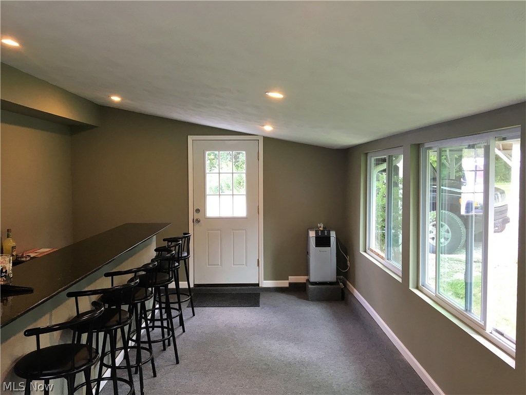 11370 Girdled Road Painesville, OH 44077 - Photo 21 of 35 Enclosed porch at the back of home perfect for entertaining.