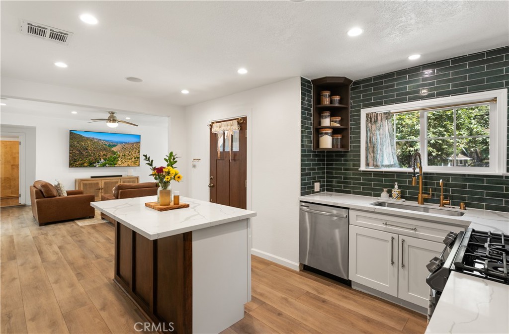 28672 Silverado Canyon Road Silverado, CA 92676 - Photo 1 of 1 a kitchen with sink a counter top space and living room