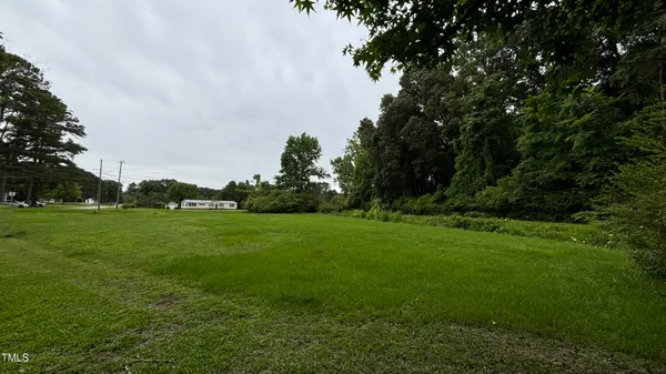 a view of a yard from a balcony