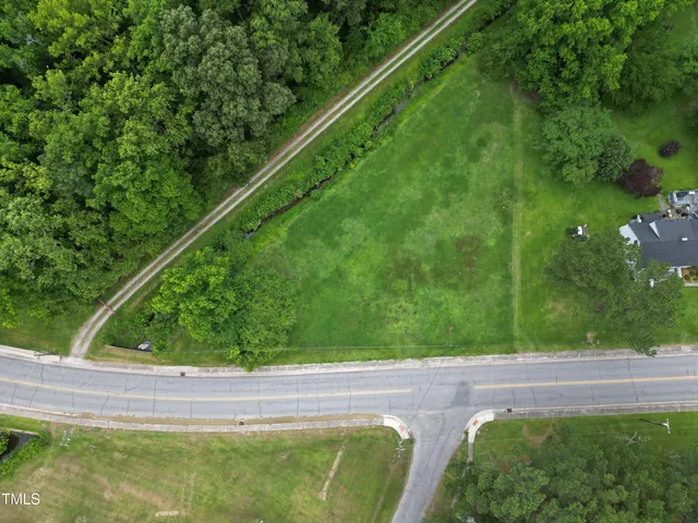 a view of swimming pool from a balcony