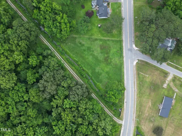 a view of a lake with a yard