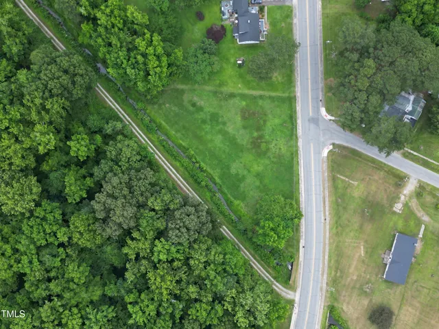 a view of a lake with a yard