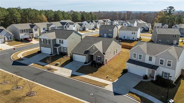 an aerial view of a house with a mountain view