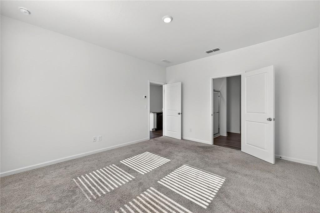 214 Georgian Way Locust Grove, GA 30248 - Photo 13 of 29 a view of an empty room