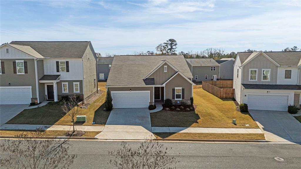 214 Georgian Way Locust Grove, GA 30248 - Photo 2 of 31 an aerial view of a house with swimming pool
