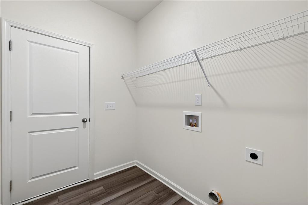 214 Georgian Way Locust Grove, GA 30248 - Photo 21 of 29 a view of a small space with wooden floor
