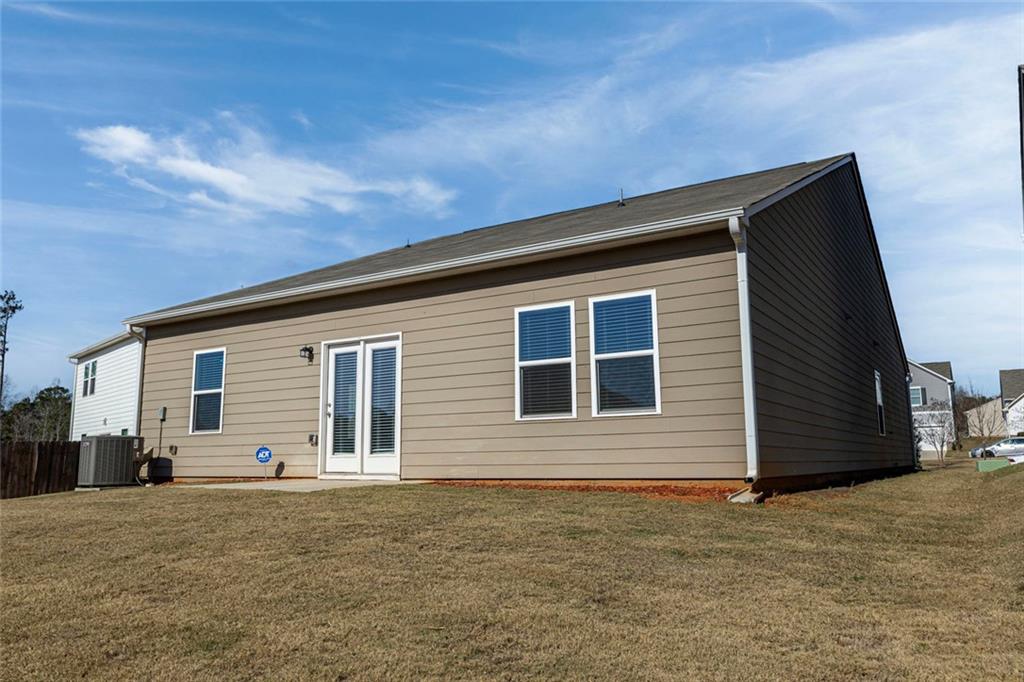 214 Georgian Way Locust Grove, GA 30248 - Photo 26 of 31 a backyard of a house