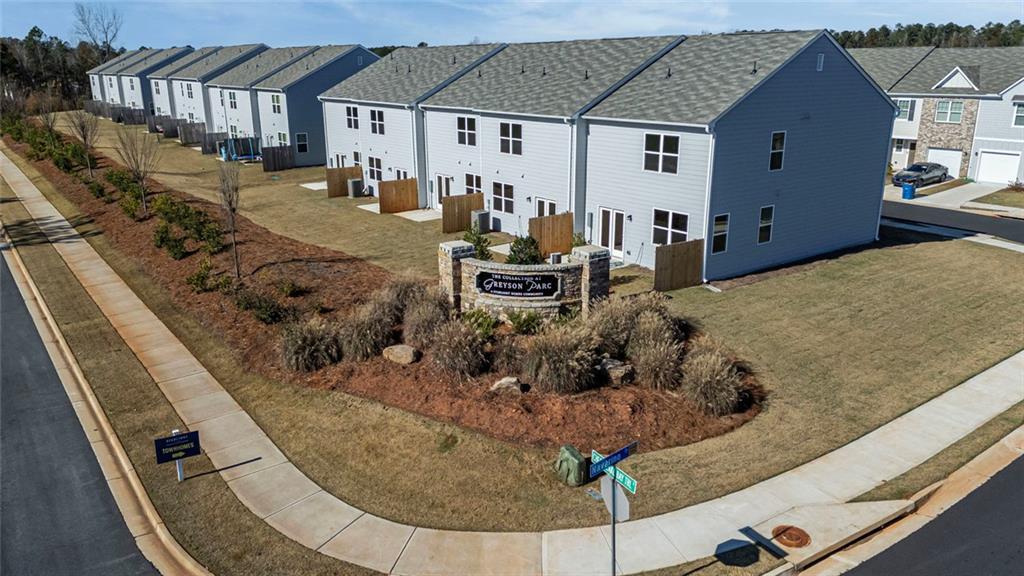 214 Georgian Way Locust Grove, GA 30248 - Photo 29 of 31 a view of a house with backyard