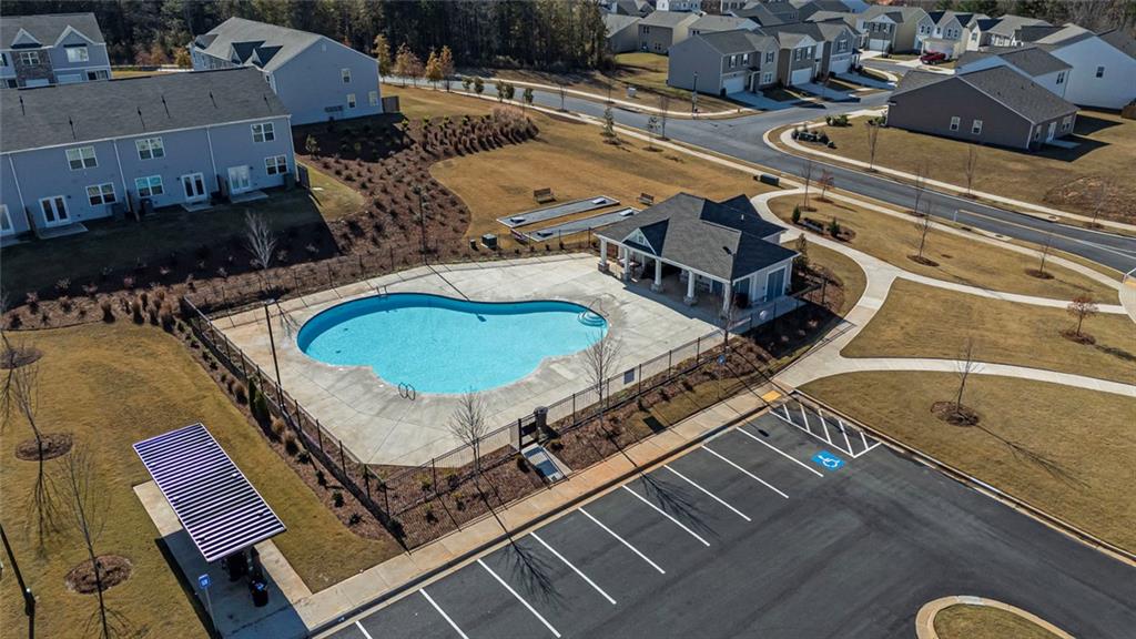 214 Georgian Way Locust Grove, GA 30248 - Photo 31 of 31 an aerial view of a house with a swimming pool and outdoor space
