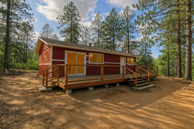 a view of a wooden bench in a yard