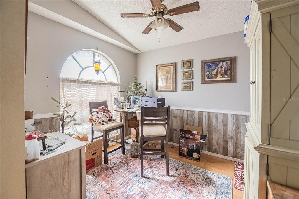 463 Emerald Cove Loop Lakeland, FL 33813 - Photo 14 of 30 a living room with furniture and a window