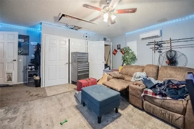 a view of a backyard with a wooden fence