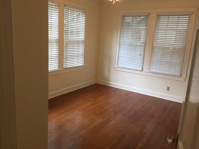 2915 Beanna Street Austin, TX 78705 - Photo 5 of 8 an empty room with a window