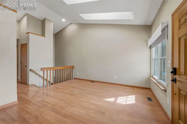 a view of a hallway with entryway