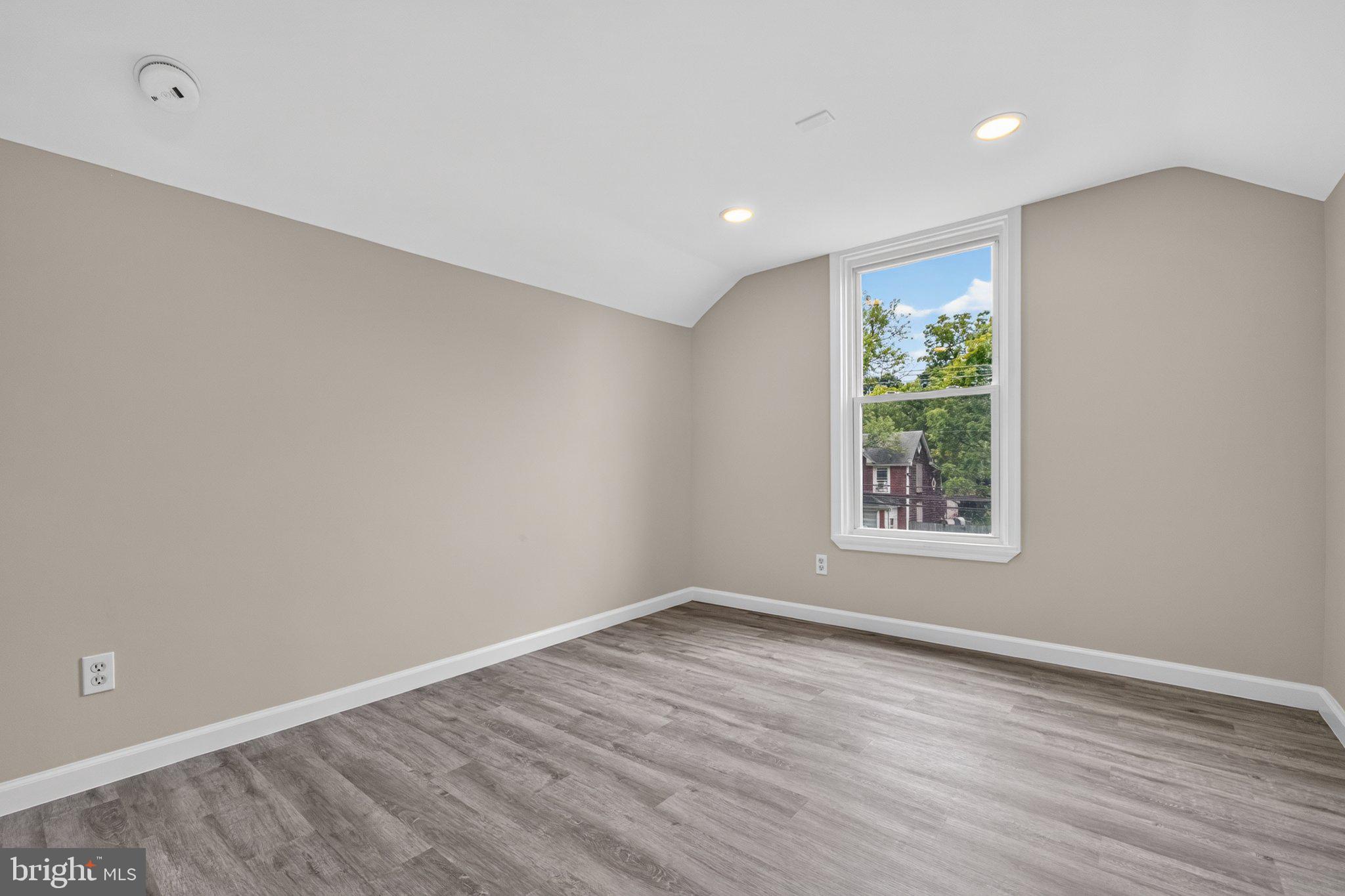 2317 Ruth Avenue Baltimore, MD 21219 - Photo 22 of 29 A bright and airy bedroom with a view.