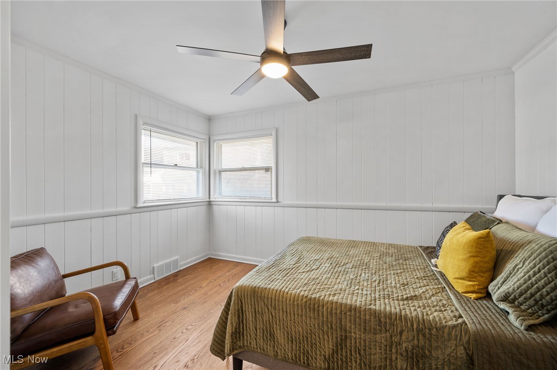 15857 Henley Road Cleveland, OH 44112 - Photo 10 of 42 Bedroom with ceiling fan and light hardwood / wood-style flooring