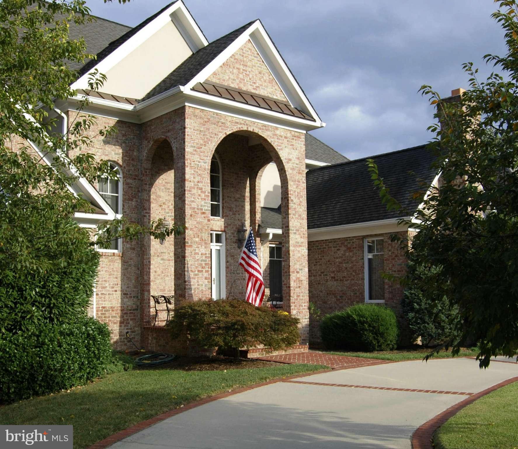 1925 South Arlington Ridge Road Arlington, VA 22202 - Photo 28 of 30 Wide circular driveway frames entrance