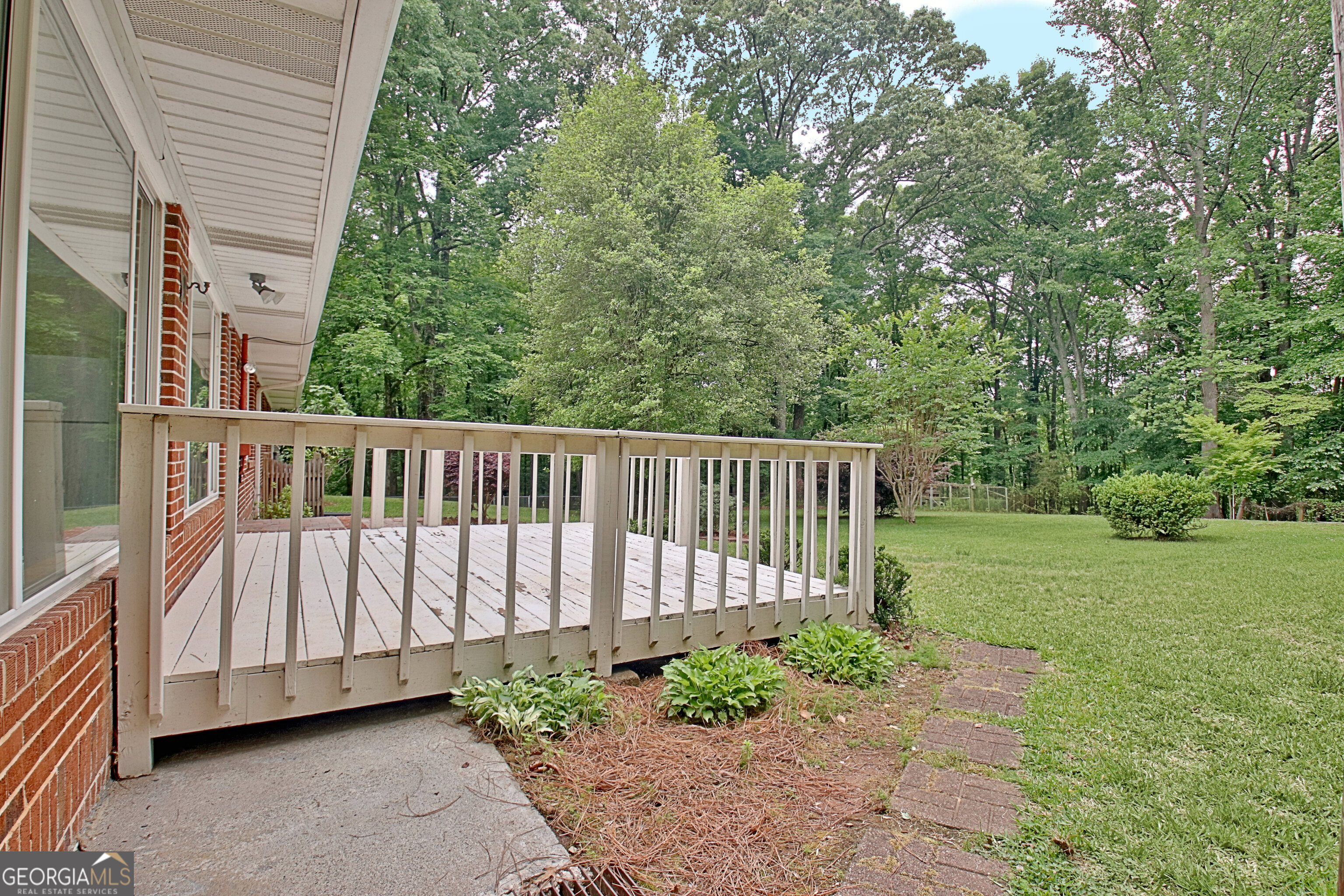 717 Tyrone Road Tyrone, GA 30290 - Photo 43 of 58 a view of a backyard with large trees