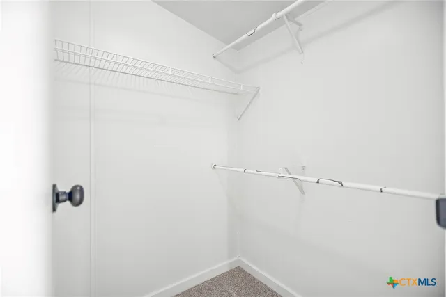 a view of vanity with mirror